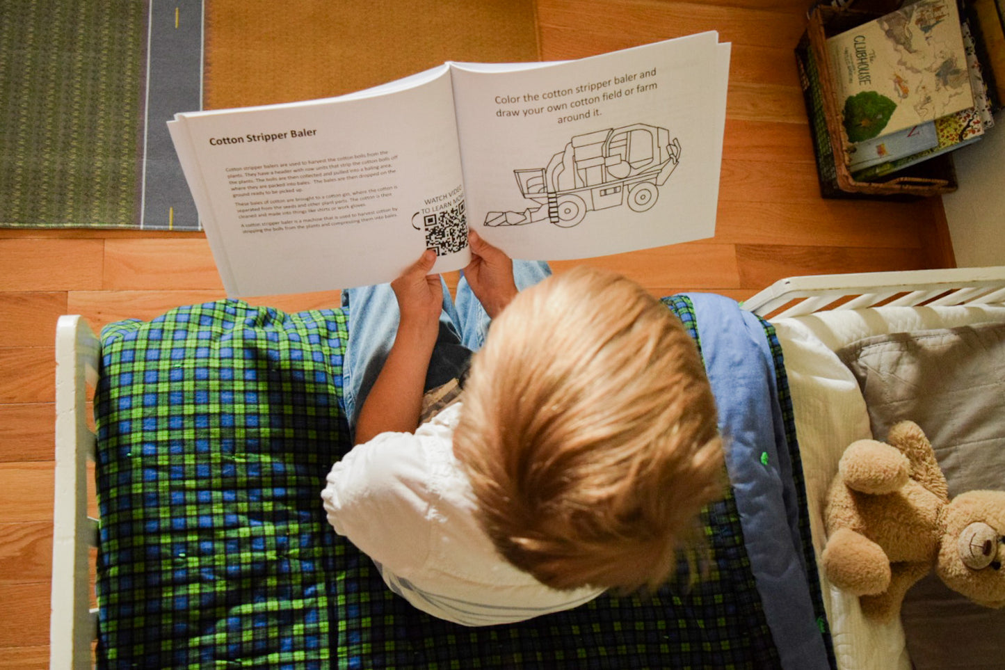 Boy holding Farm Learning Book